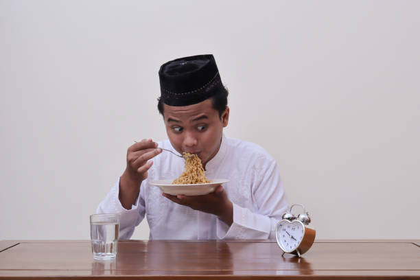 Kapan Terakhir Boleh Makan dan Minum Saat Sahur? Gus Baha: Perhatikan Waktu Imtiyad Setelah Imsak